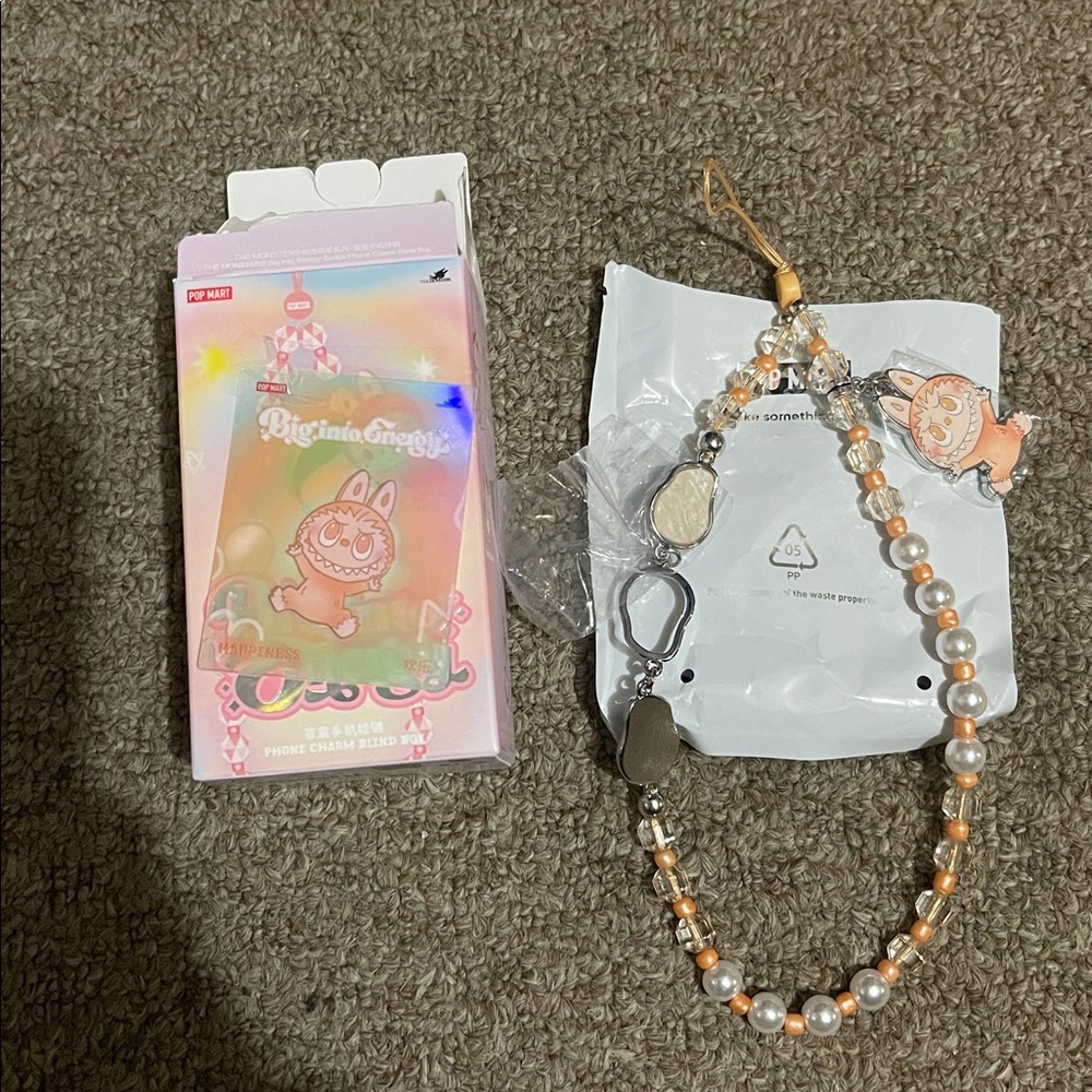 Big Into Energy Confirmed Phone Charm